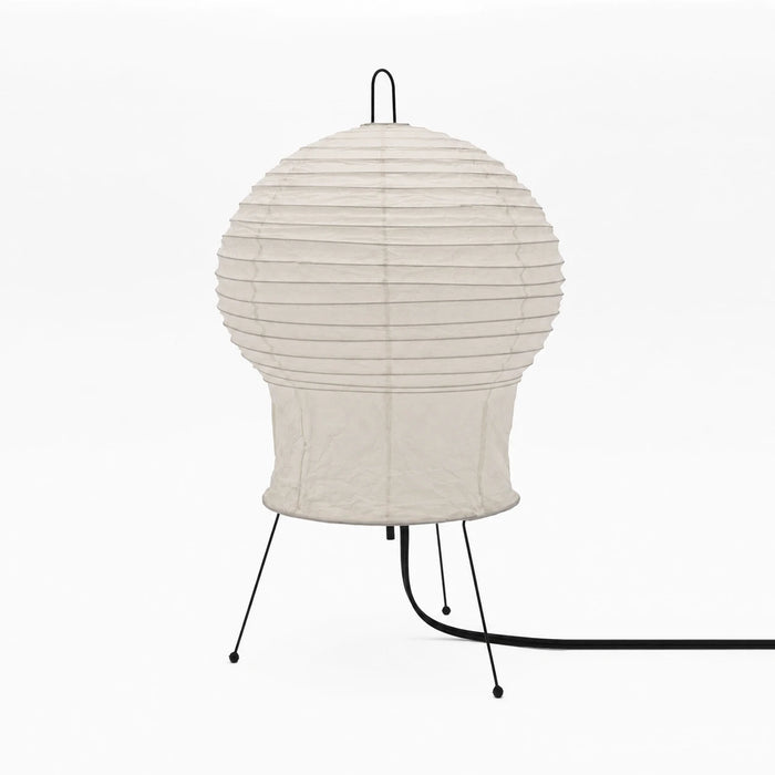 Bulb-shaped mulberry paper table lamp with a wire tripod base on a white background