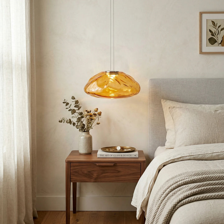 Amber_Halo_Glass_Pendant_Light_Above_Bedside_Table_Woorglamp