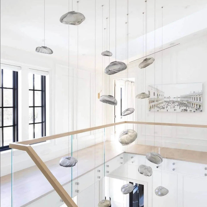 Grey_Halo_Glass_Pendant_Lights_in_Modern_Stairwell_Woorglamp