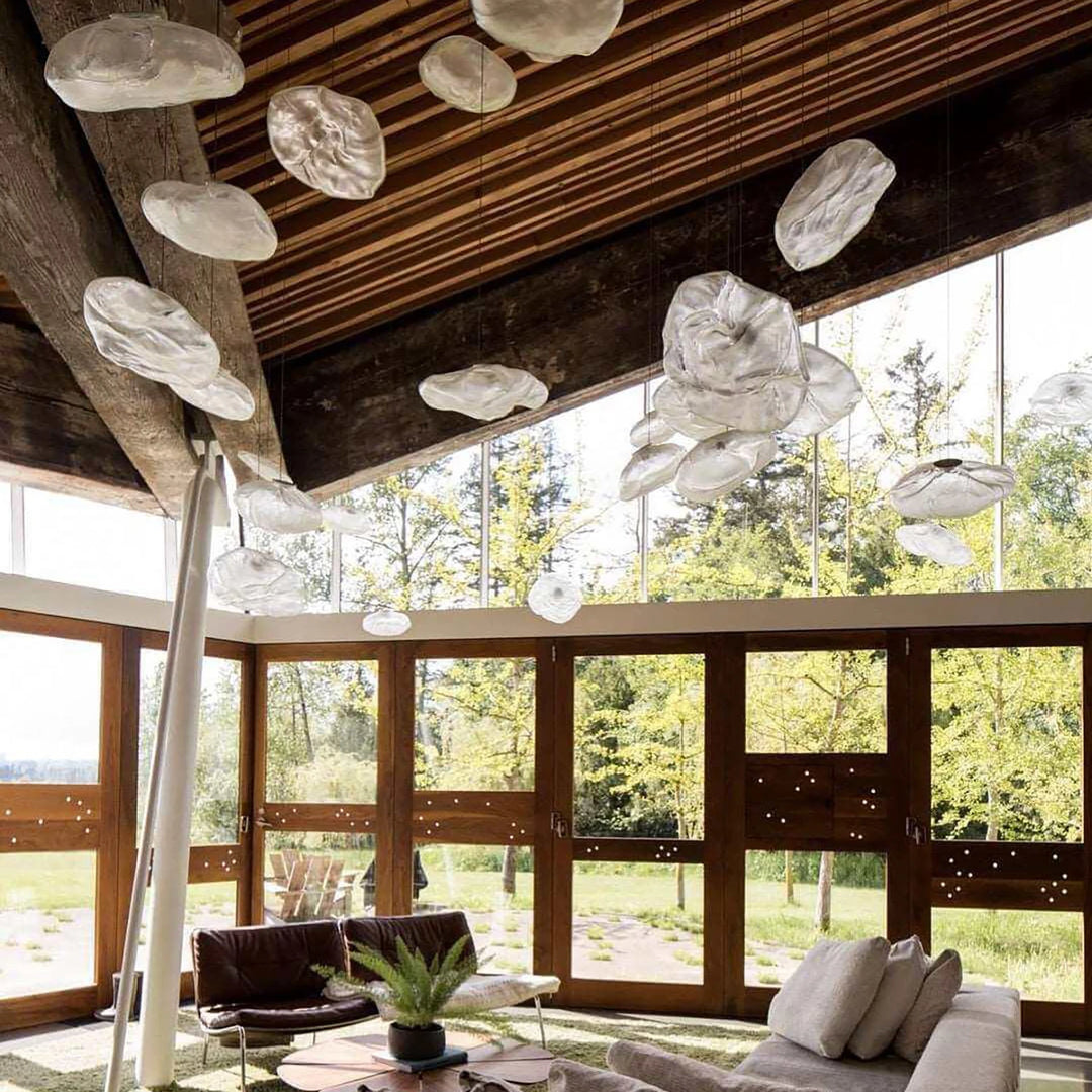 Clear_Halo_Glass_Pendant_Lights_in_Rustic_Living_Room_Woorglamp