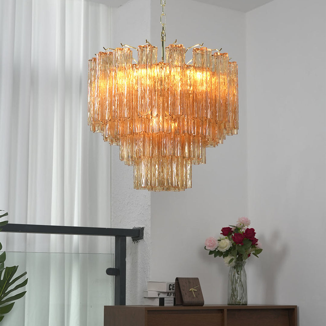 Murano Star Tube Chandelier with amber glass against a black accent wall with sheer curtains