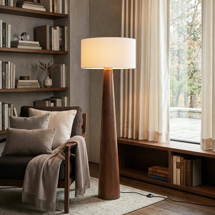 Tapered_Wood_Floor_Lamp_in_Cozy_Home_Library_Woorglamp
