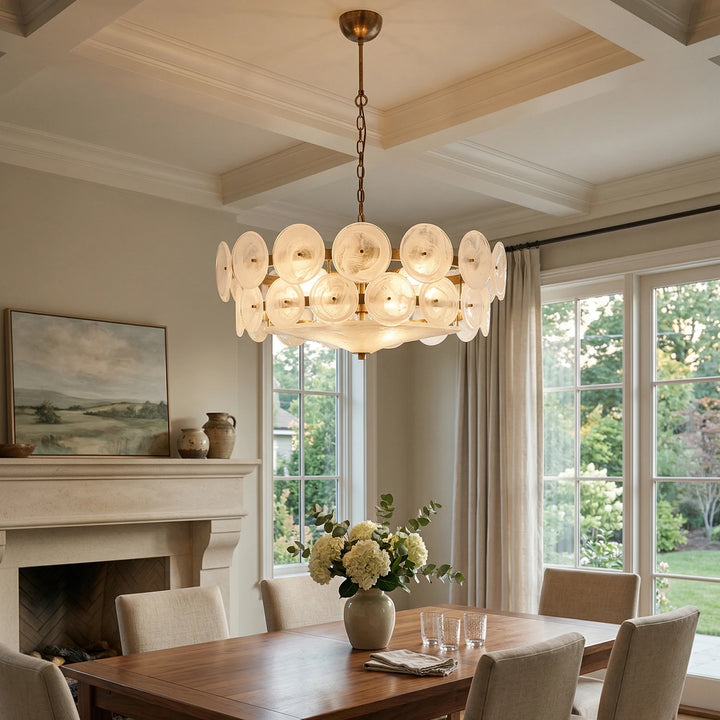 Clear_Glass_Disc_Chandelier_in_Dining_Room_With_Fireplace_Woorglamp