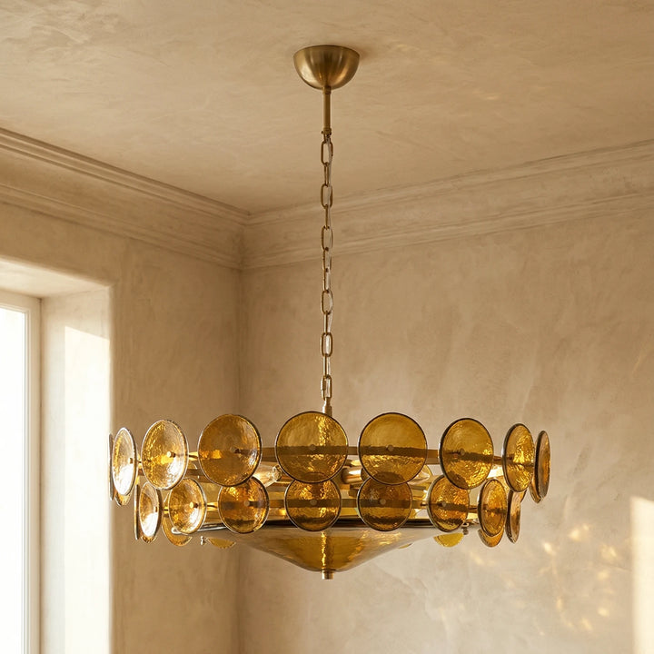 Clear_Glass_Disc_Chandelier_Lit_Up_Warm_Wall_Space_Woorglamp