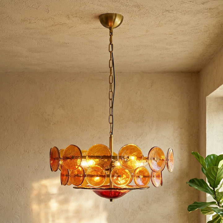Olive_Amber_Glass_Disc_Chandelier_Lit_Up_Warm_Wall_Space_Woorglamp
