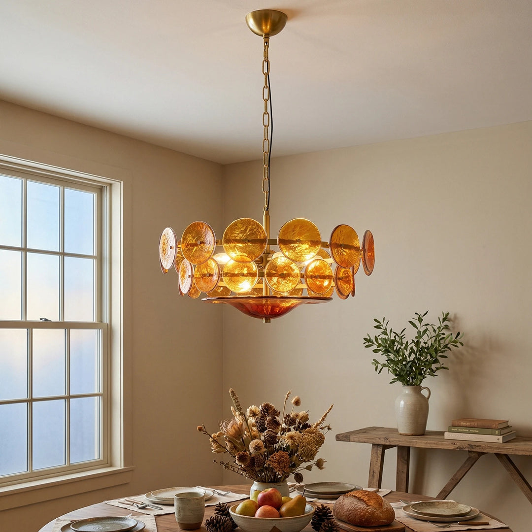 Amber_Glass_Disc_Chandelier_in_Dining_Room_With_Large_Windows_Woorglamp