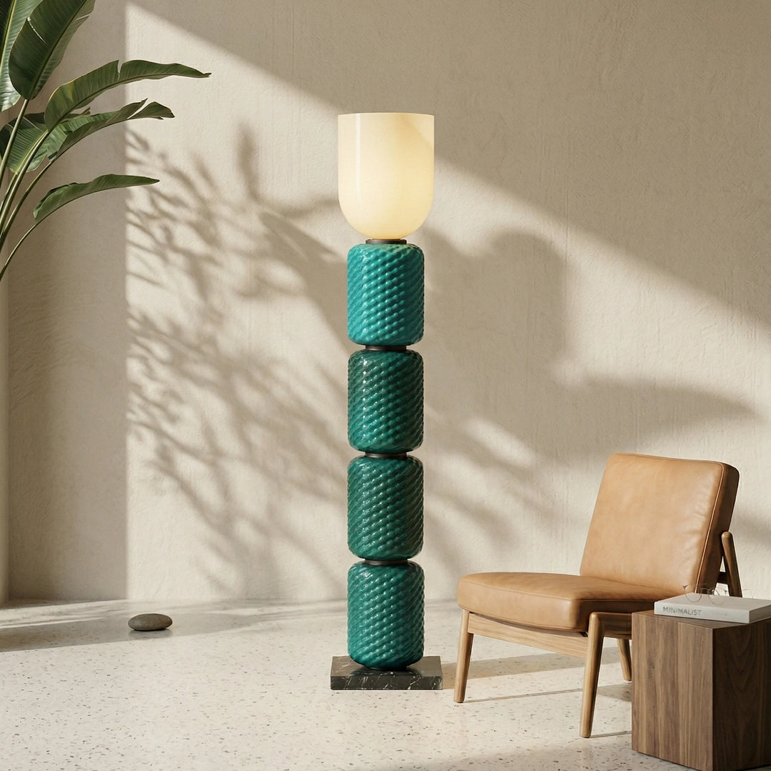 Teal_Tiered_Column_Glass_Lamp_in_Sunlit_Living_Space_Woorglamp