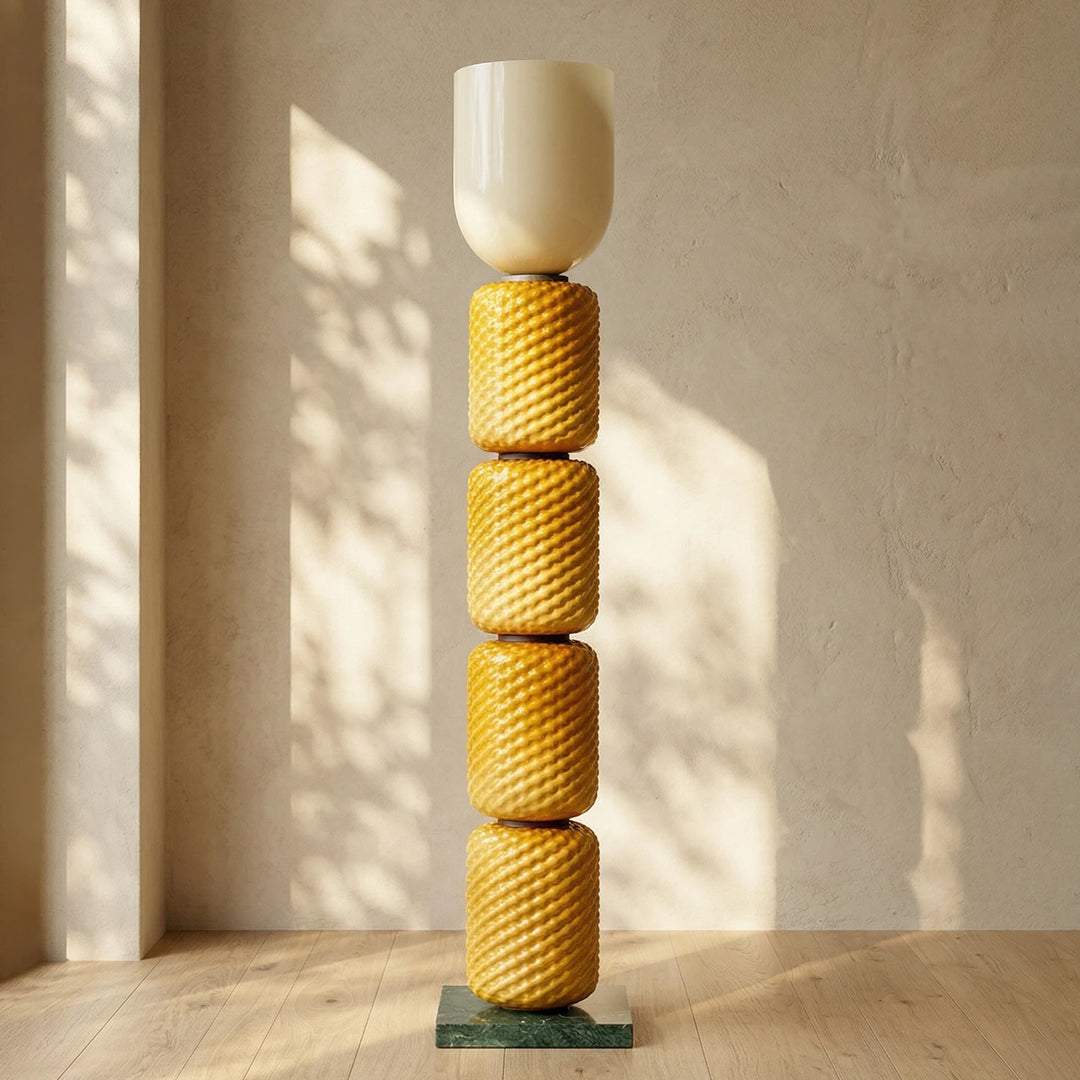 Pink_Tiered_Column_Glass_Lamp_in_Textured_Wall_Space_Woorglamp