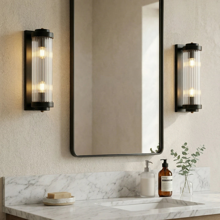 Black_Brass_Vertical_Glass_Wall_Lamp_in_Bathroom_Vanity_Woorglamp
