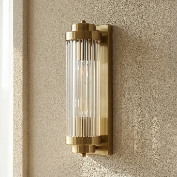 Brass_Vertical_Linear_Wall_Lamp_Textured_Wall_Shot_Woorglamp