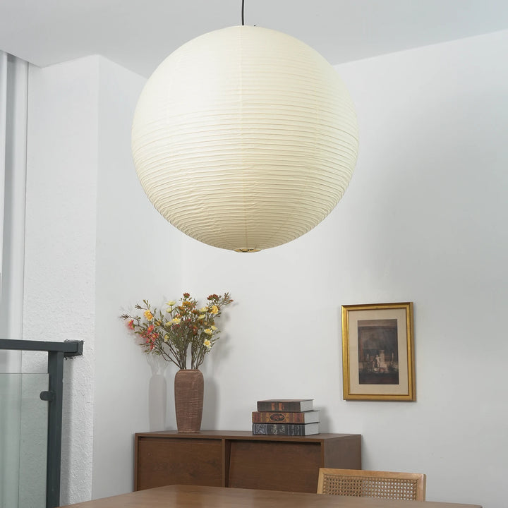 Round_Washi_Paper_Pendant_Light_in_Sunlit_Workspace_Woorglamp