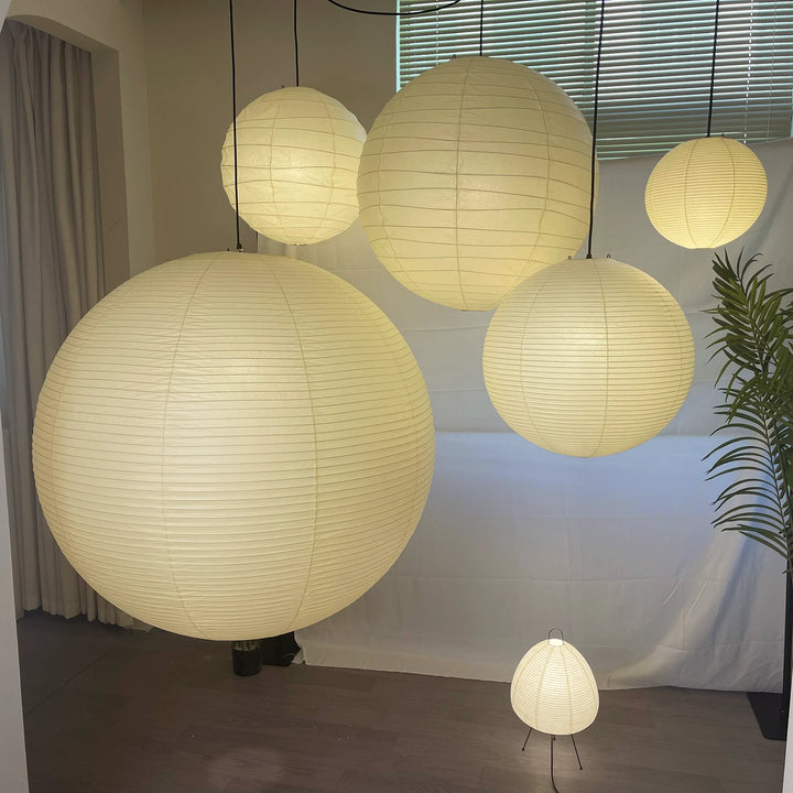Round_Washi_Paper_Pendant_Light_in_Curtained_Minimalist_Space_Woorglamp