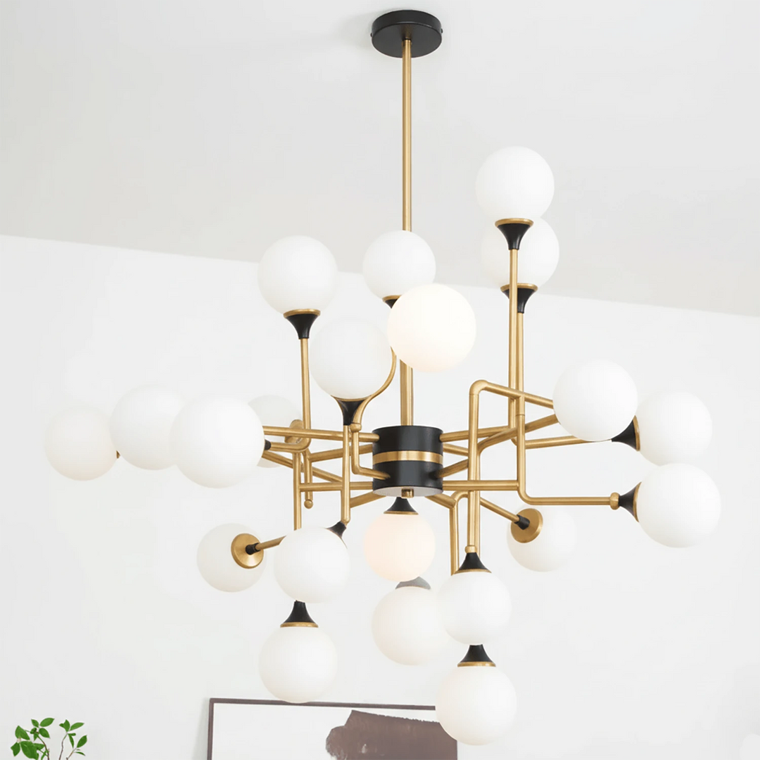 Brass_Sputter_Glass_Chandelier_in_Living_Room_With_Bookshelf_Woorglamp