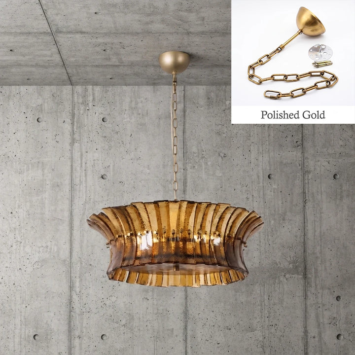 Amber glass drum chandelier with polished gold chain and canopy