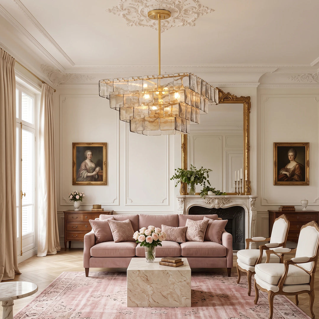 Amber glass chandelier lighting a classic sitting room with portrait art