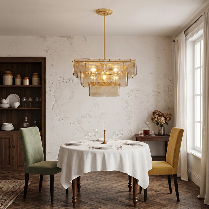 Amber glass panel chandelier over a small round table in a vintage dining corner
