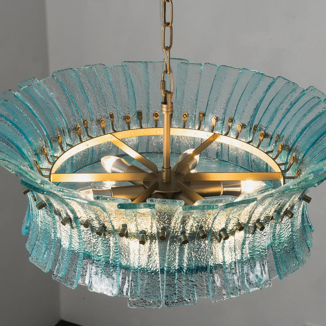Interior view showing the brass hub and sockets inside the aqua glass shade