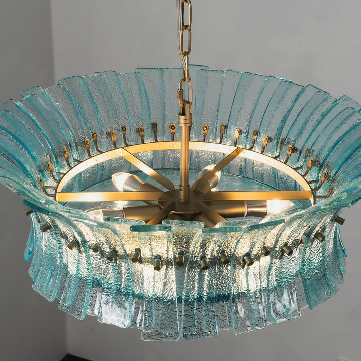 Interior view showing the brass hub and sockets inside the aqua glass shade