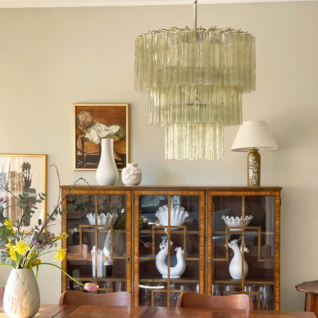 Fantastic Murano Tubes Chandelier with amber glass in a room with a china cabinet and white table lamp