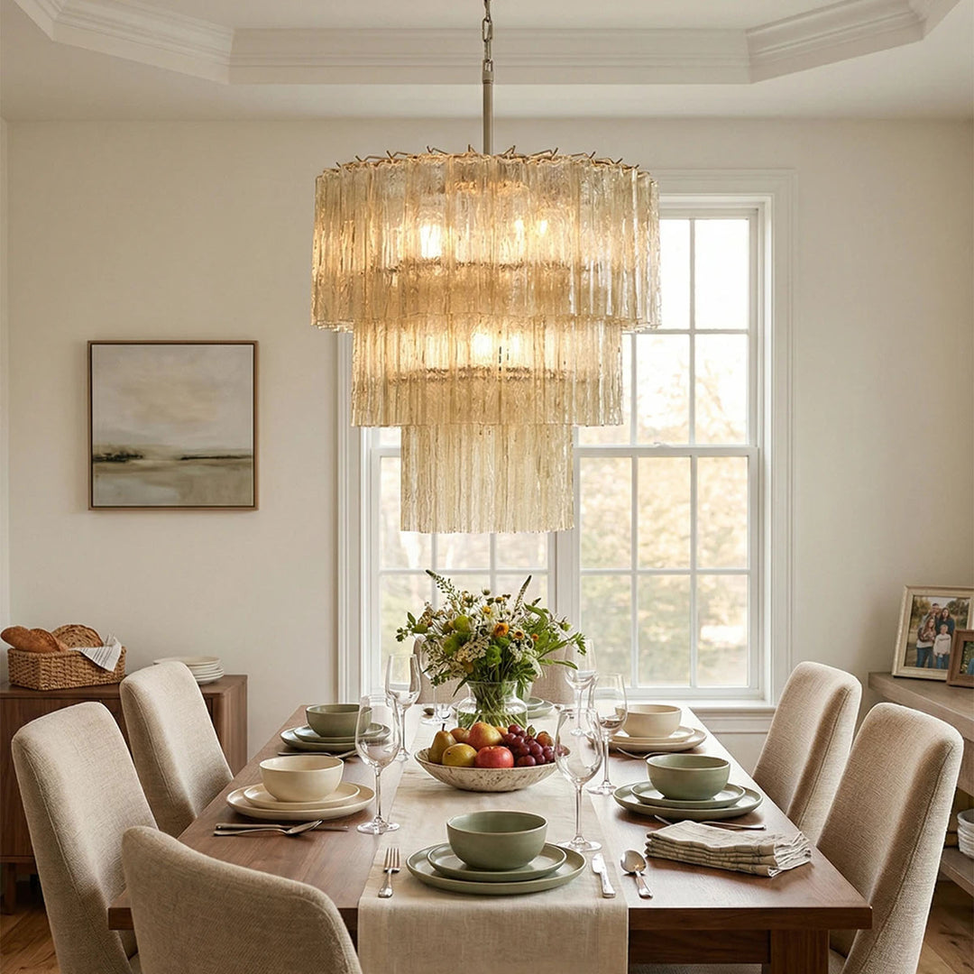 Fantastic Murano Tubes Chandelier with amber glass above a formal dining table with place settings