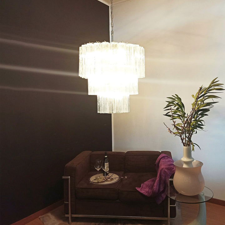 Fantastic Murano Tubes Chandelier with clear glass in a living room with a brown sofa