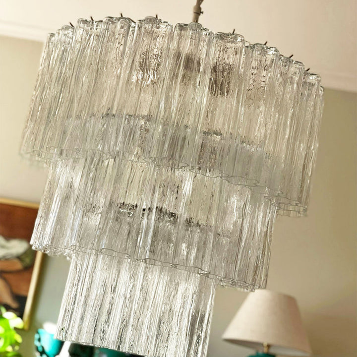 Fantastic Murano Tubes Chandelier with clear glass hanging in a minimalist room with white walls