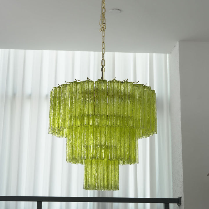 Fantastic Murano Tubes Chandelier with lime green glass hanging in a bright room with sheer white curtains