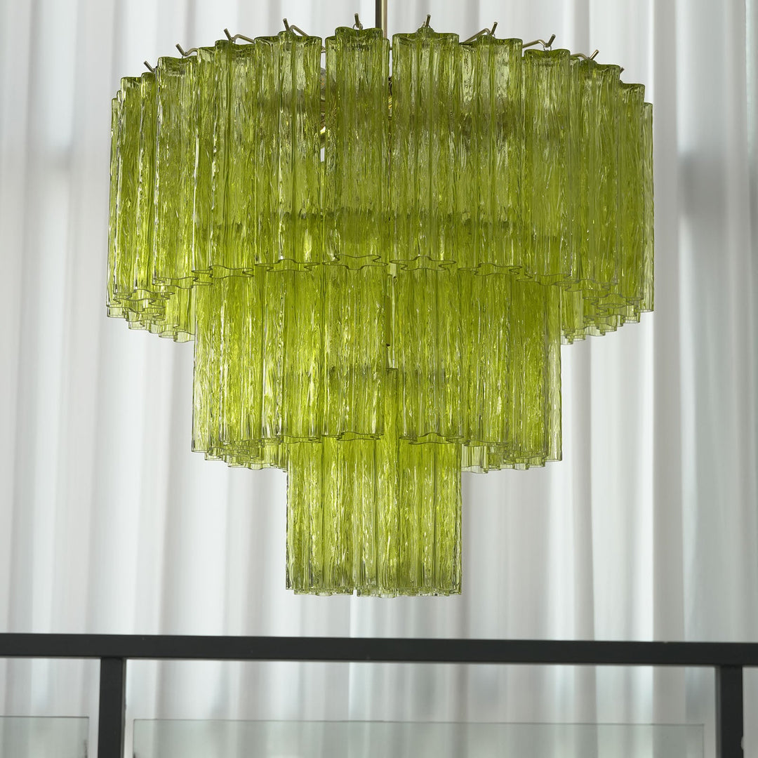 Fantastic Murano Tubes Chandelier with lime green glass hanging in a bright room with sheer white curtains