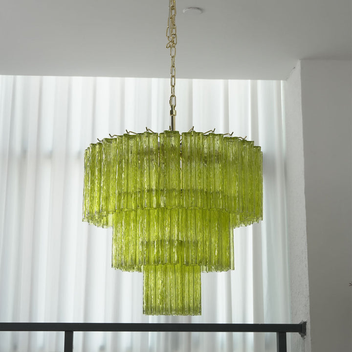 Fantastic Murano Tubes Chandelier with lime green glass hanging in a bright room with sheer white curtains
