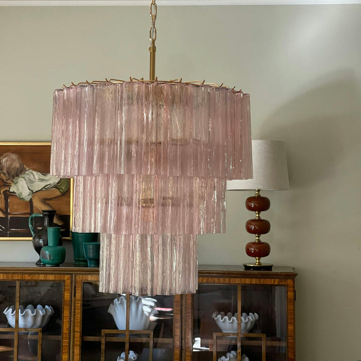 Fantastic Murano Tubes Chandelier with soft pink glass in a room with a china cabinet and table lamp
