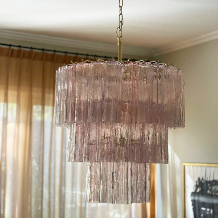 Fantastic Murano Tubes Chandelier with soft pink glass hanging in a room with sheer curtains