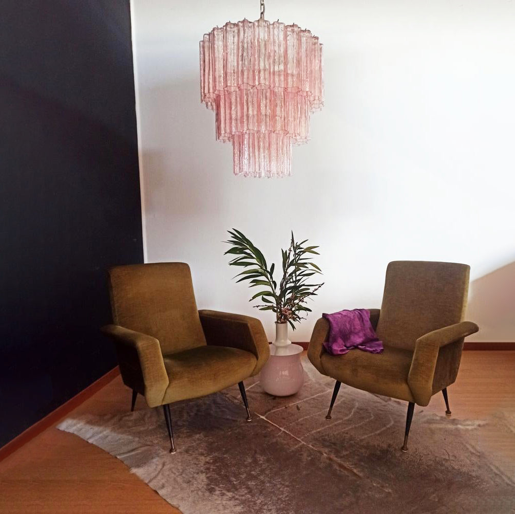 Fantastic Murano Tubes Chandelier with soft pink glass in a dark corner with two brown chairs