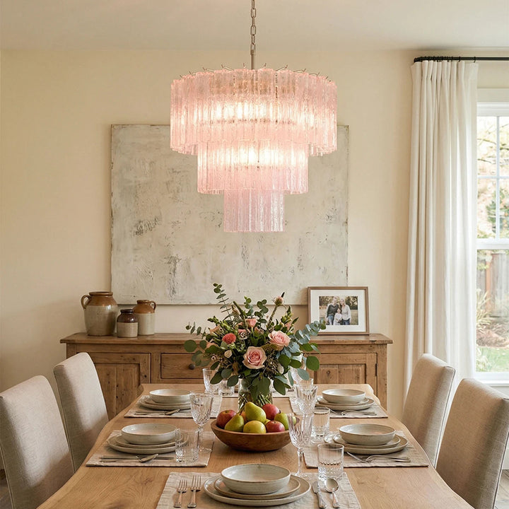 Fantastic Murano Tubes Chandelier with soft pink glass above a bright dining table with floral decor
