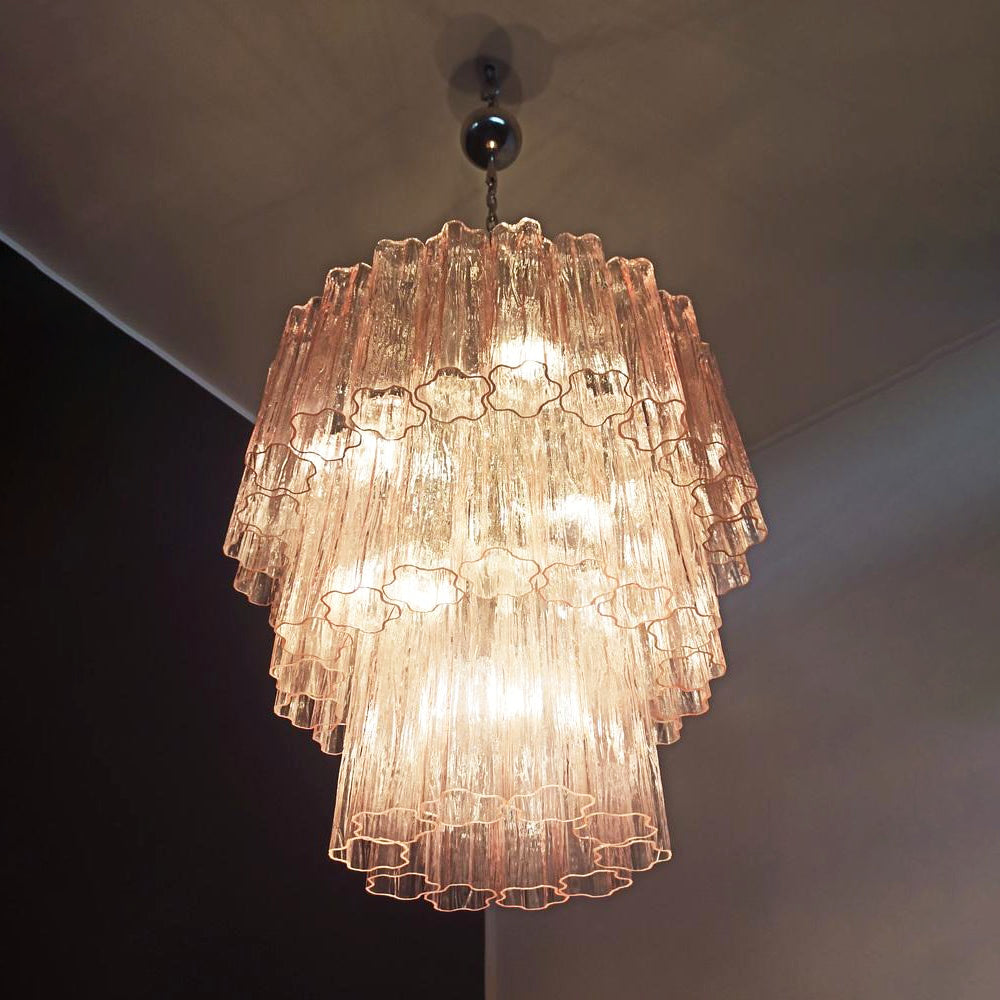 Split view showing pink Murano glass texture, star-shaped edges, and light transmission