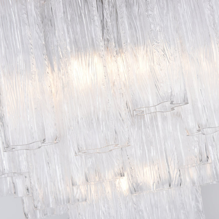 Top view of Murano Glass Tube Chandelier with amber gold star-shaped glass elements on white background