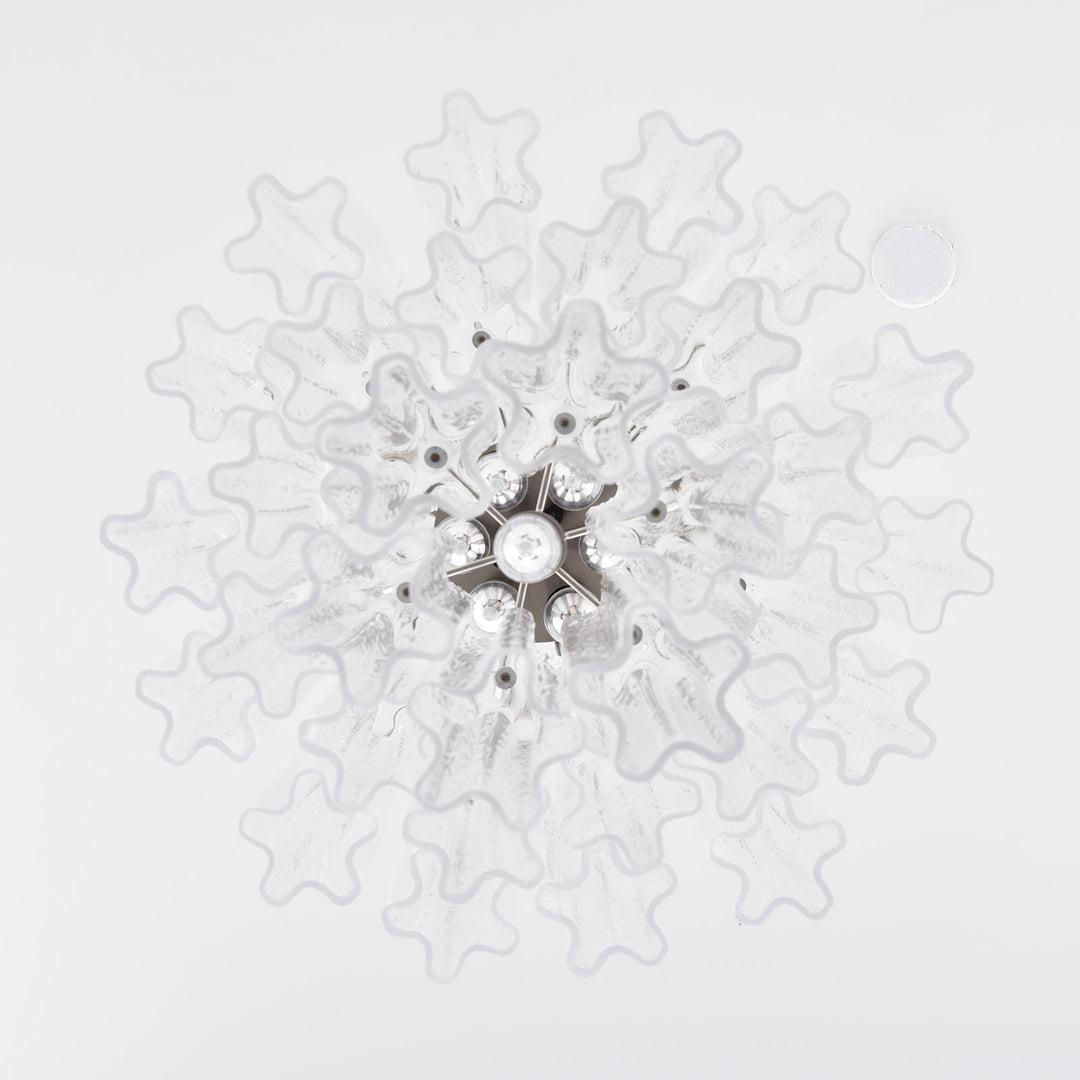 Top view of Murano Glass Tube Chandelier with clear star-shaped glass elements on white background
