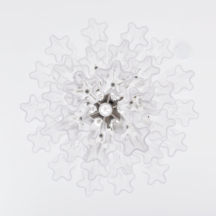 Top view of Murano Glass Tube Chandelier with clear star-shaped glass elements on white background