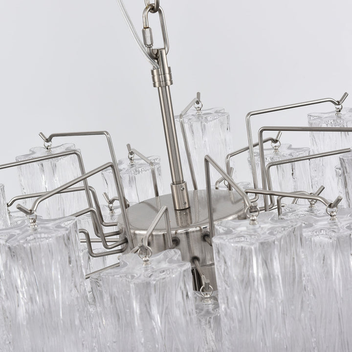 chandelier-metal-frame-closeup-woorglamp	Close-up of the silver metal frame holding the glass tubes on the chandelier