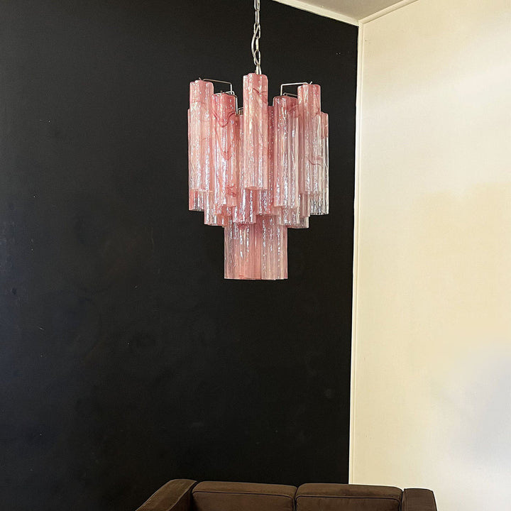 Murano Glass Tube Chandelier with pink gradient glass against a black and white wall