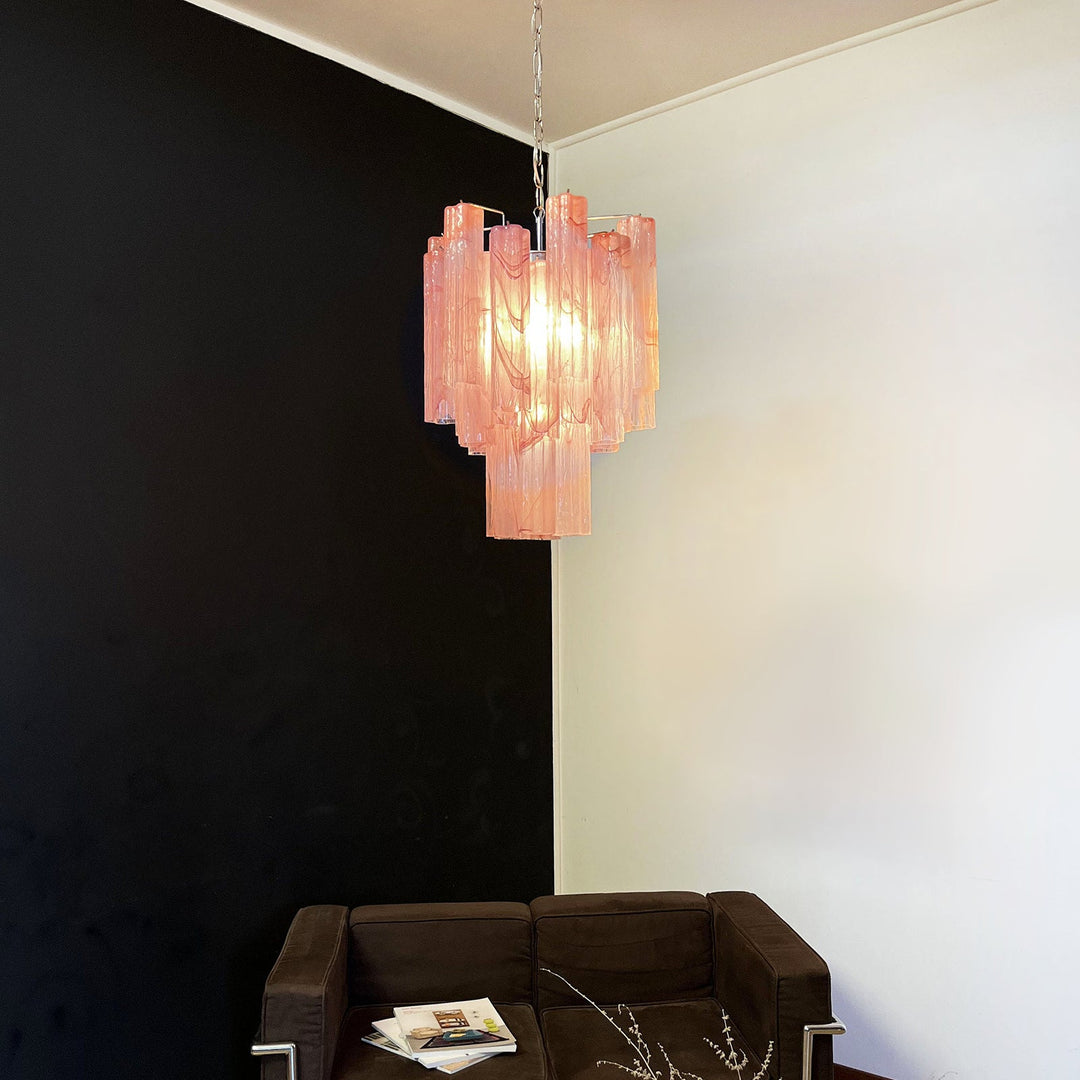 Murano Glass Tube Chandelier with pink gradient glass against a black accent wall