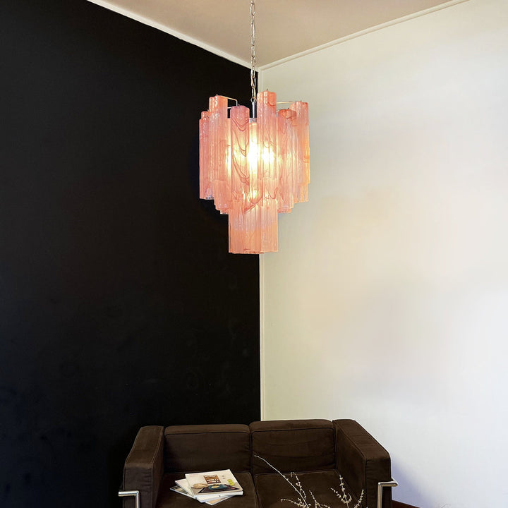 Murano Glass Tube Chandelier with pink gradient glass against a black accent wall