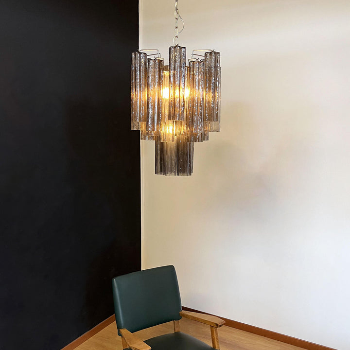 Murano Glass Tube Chandelier with smoke gray glass in a room with a green accent chair