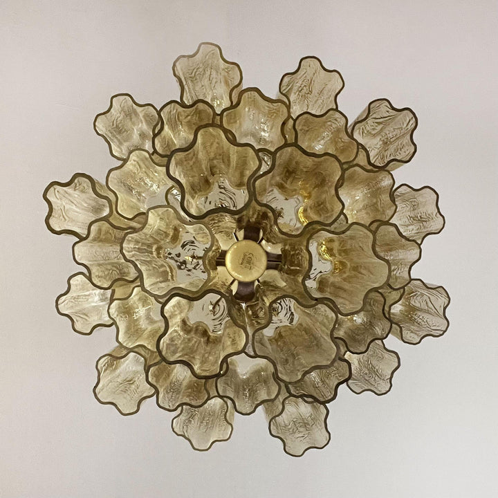 Top view of Murano Glass Tube Chandelier with smoke gray star-shaped glass elements on white background