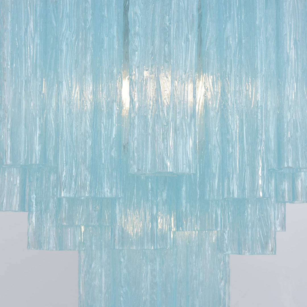 Full view of Murano Glass Tube Chandelier with turquoise glass tubes hanging from a white ceiling