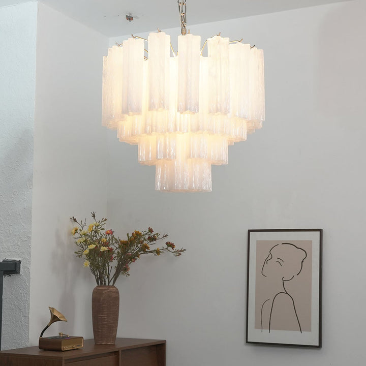 Murano Star Tube Chandelier with clear glass tubes in a minimalist room with art decor