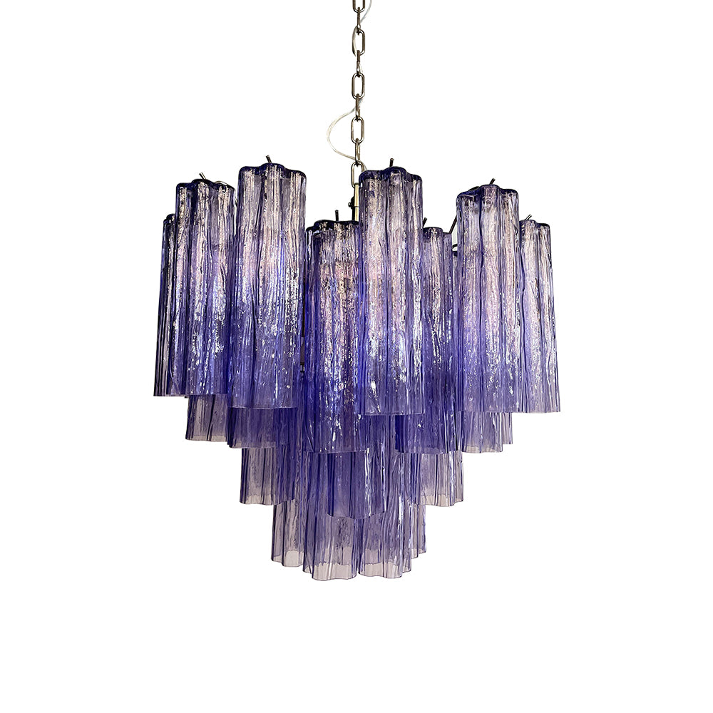 Murano Star Tube Chandelier with clear glass tubes on a plain white wall
