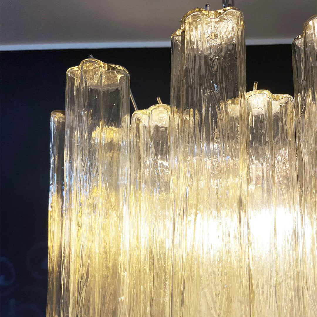 Close-up of the rippled texture on clear Murano glass tubes of the chandelier