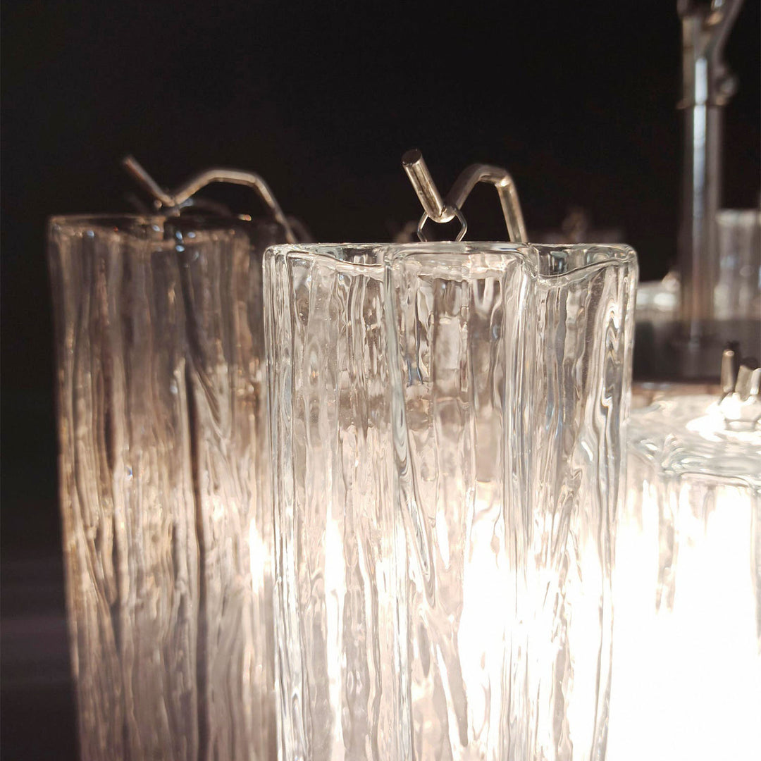Close-up of the rippled texture on clear Murano glass tubes of the chandelier
