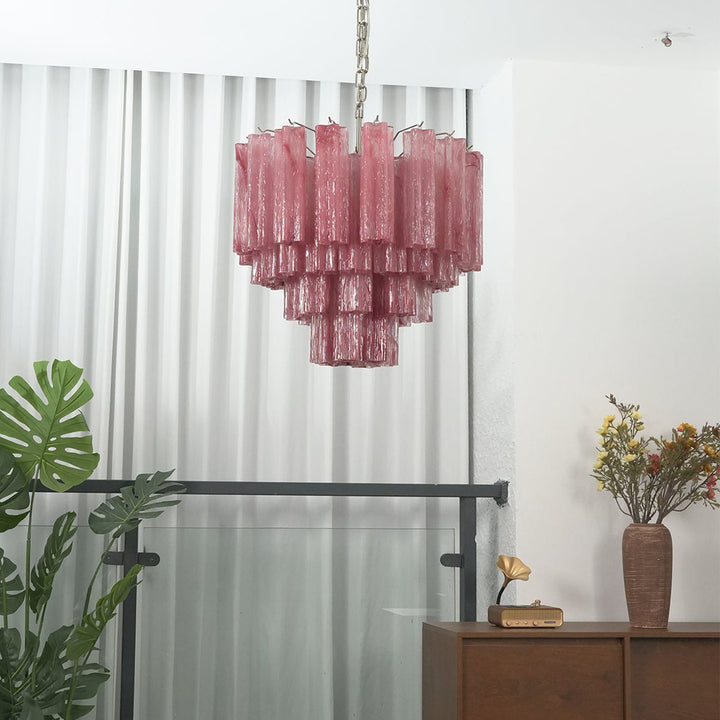 Murano Star Tube Chandelier with soft pink glass in a minimalist room with plants