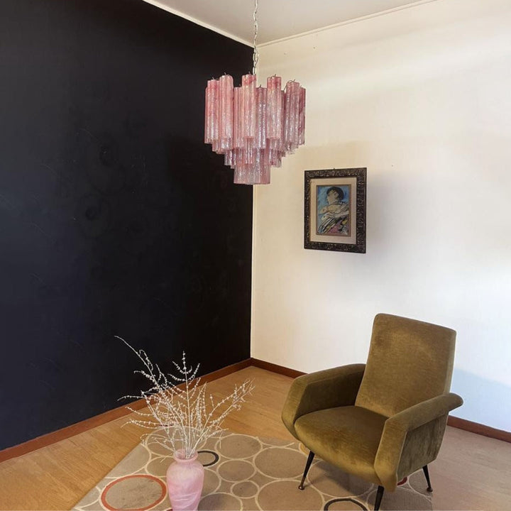 Murano Star Tube Chandelier with pink glass in a room with a green upholstered chair